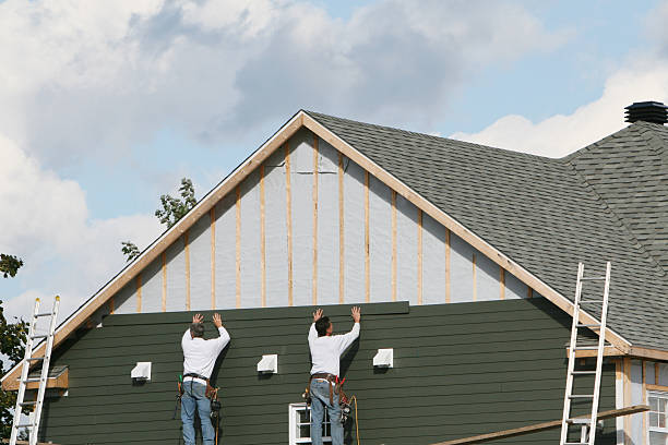Professional Siding Installation technician working in East Setauket, NY